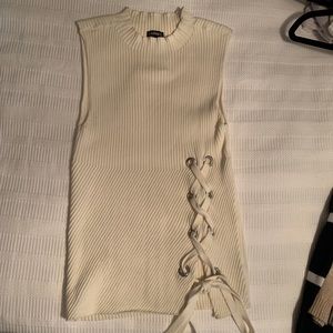 Ribbed mock neck sleeveless sweater